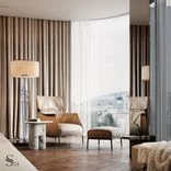 Lounge area with leather armchair and accent floor lamp